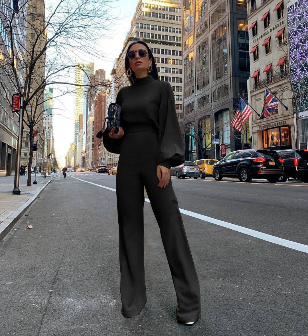 Solid color high neck backless long sleeved casual jumpsuit